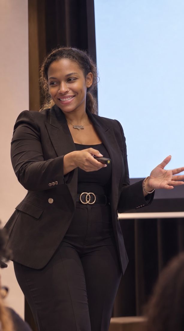 Dr. Gee presenting with a slide clicker